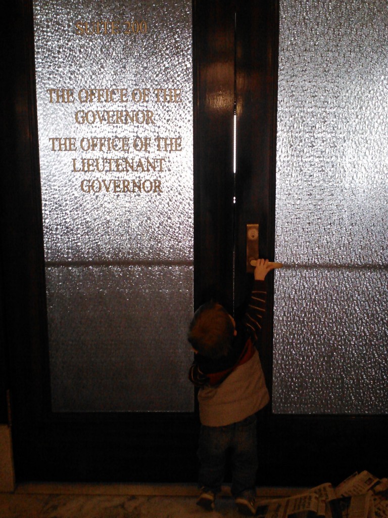 Pookie tries to enter the Governor's office, which was  NOT open. 